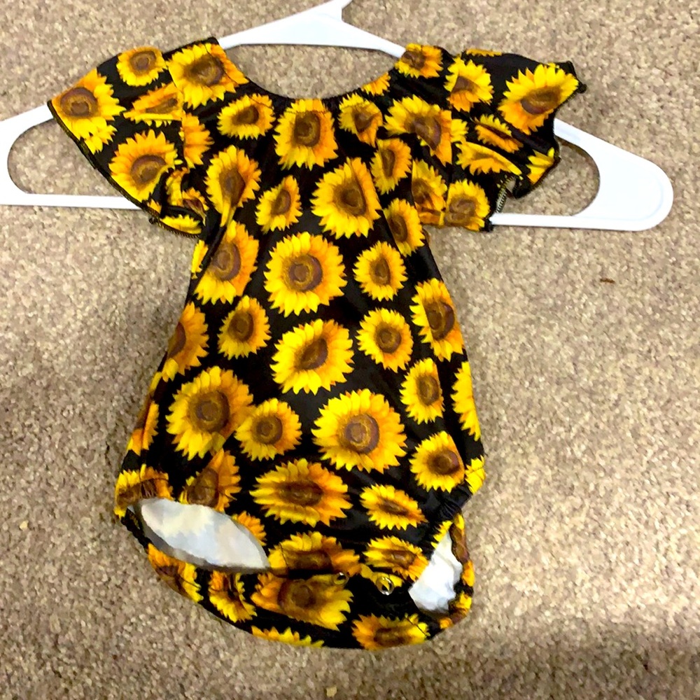 12 to 18 months sunflower leotard, buttons at bottom for access.